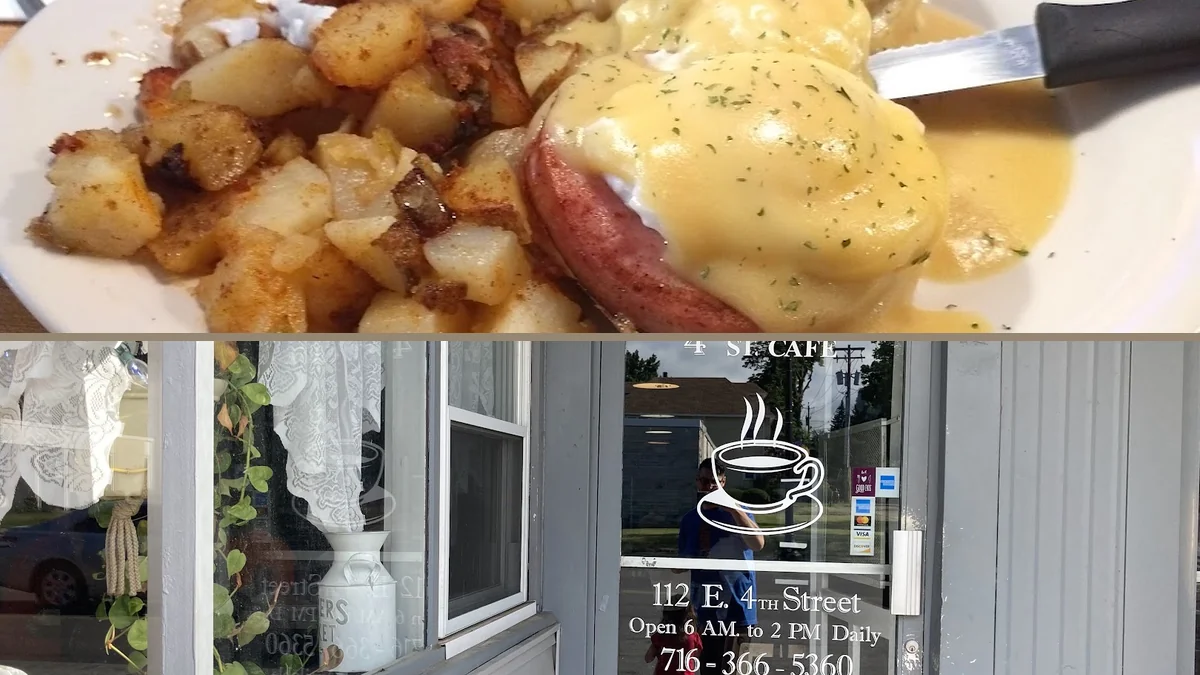 Coffee cups beside a diner breakfast spread.